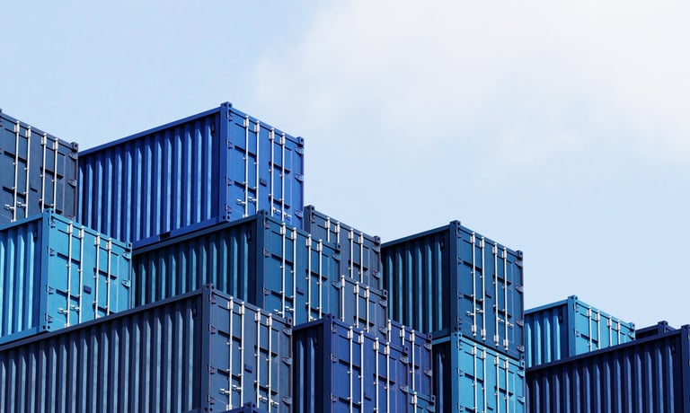 Stack of blue container boxes with sky background. Cargo freight shipping for import and export logistics